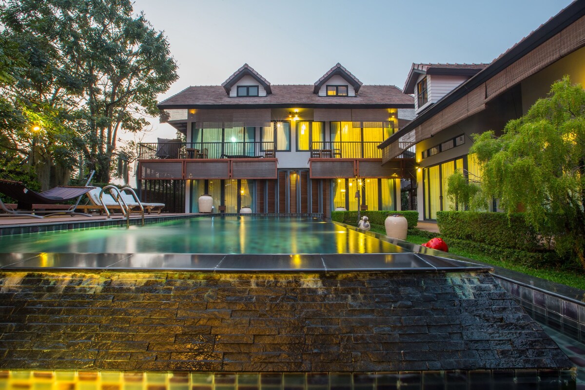 Private tropical style pool villa in the World Club Land project, Doi Kham view.